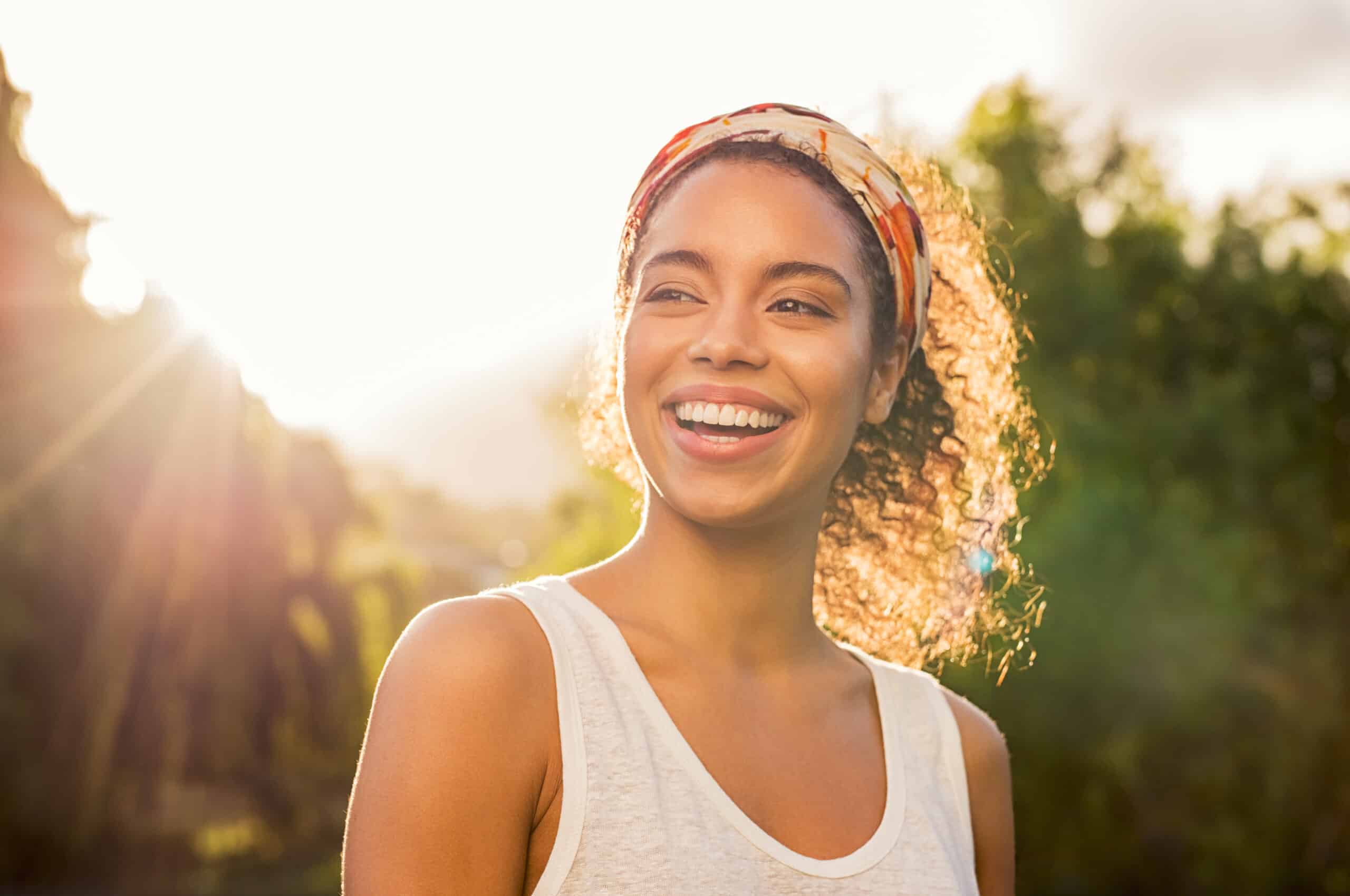 woman with curls smiling - brainspotting